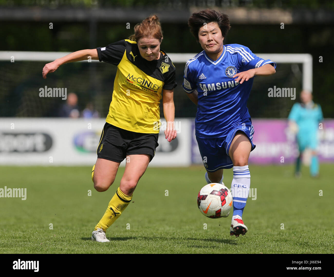 Sarah Wiltshire of Watford Ladies & Ji So-yun of Chelsea Ladies battle for the ball during the Continental Cup (Group One) match between Watford Ladie Stock Photo