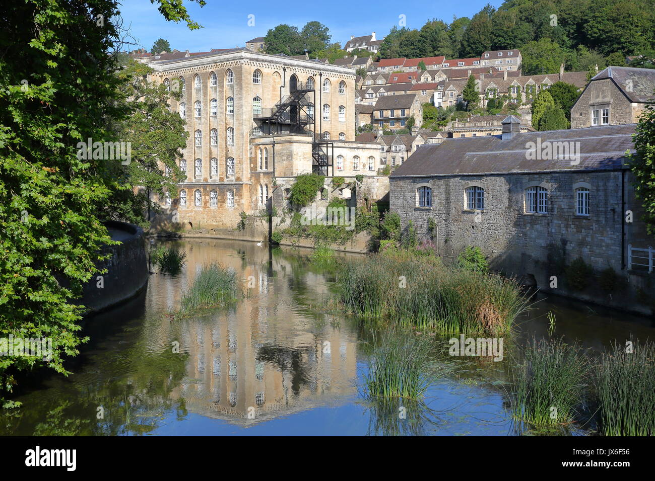 View of Abbey Mill building on river Avon with Tory neighborhood in the