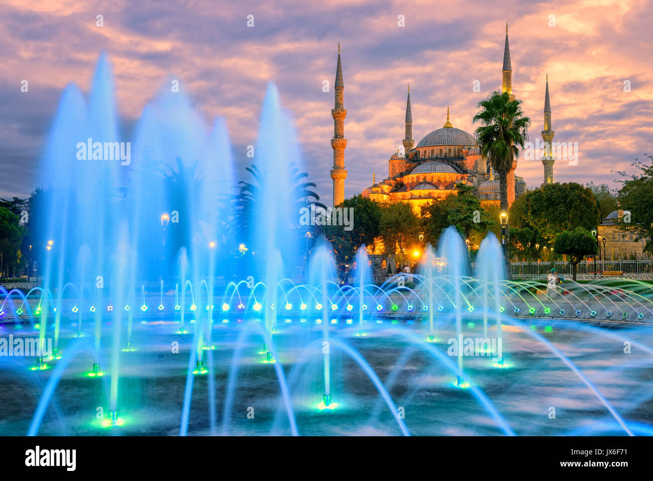 Blue Mosque (Sultanahmet camii) with blue illuminated fountain in the ...