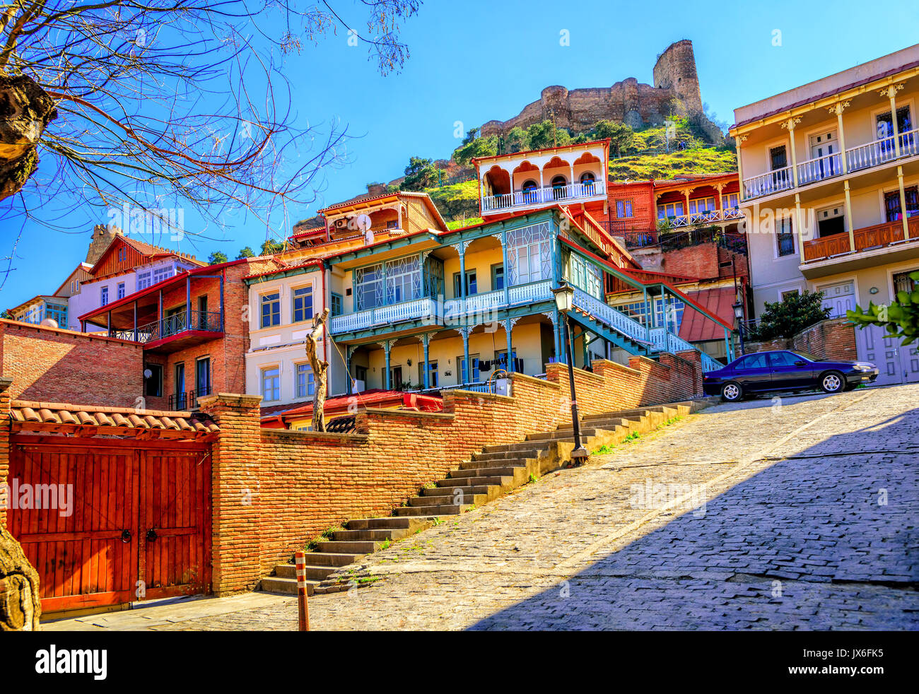 Traditional carved balconies and colorful wooden houses in the Old Town of Tbilisi, Georgia Stock Photo