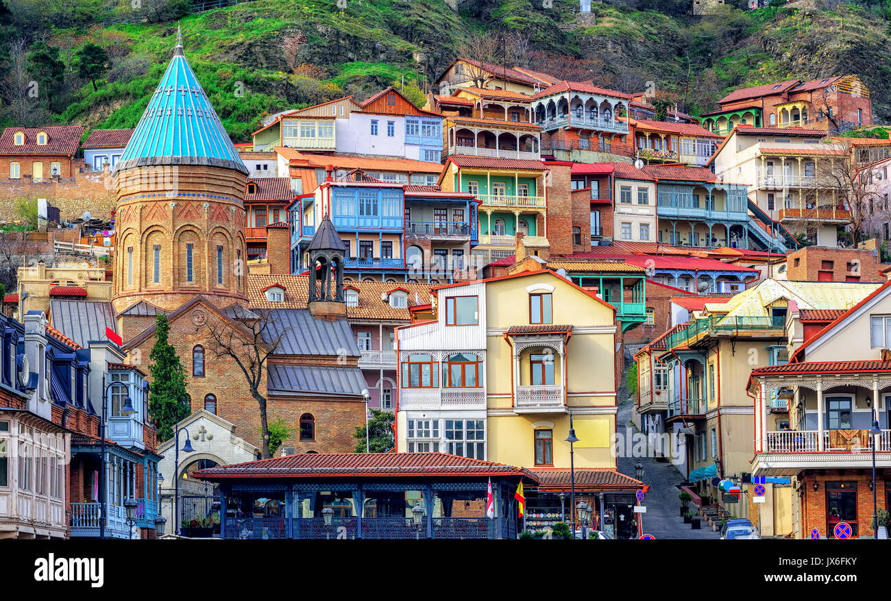 Colorful traditional houses with wooden carved balconies in the Old Town of Tbilisi, Georgia Stock Photo