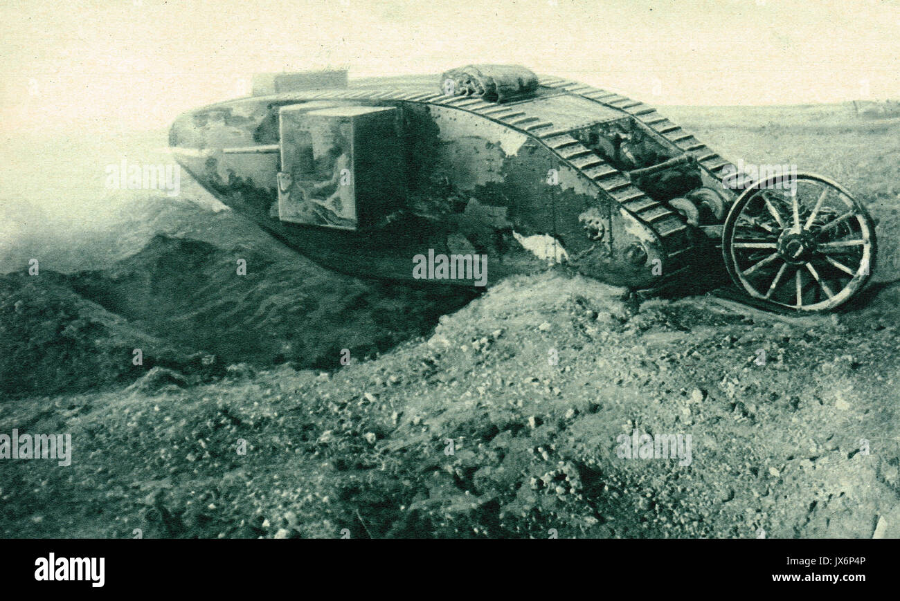 Tank astride large shell hole, WW1 Stock Photo
