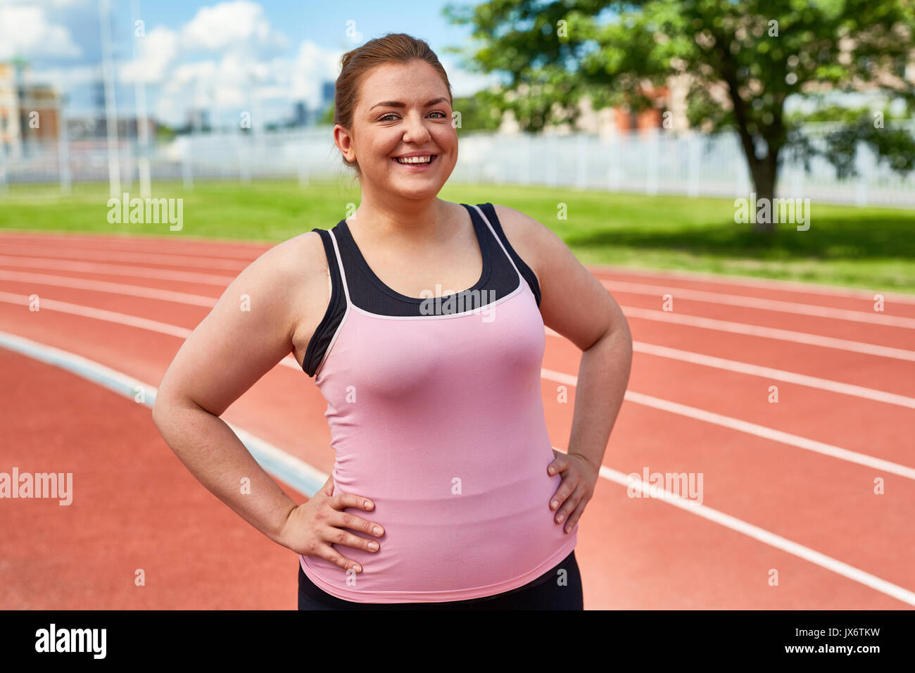 Working out on stadium Stock Photo
