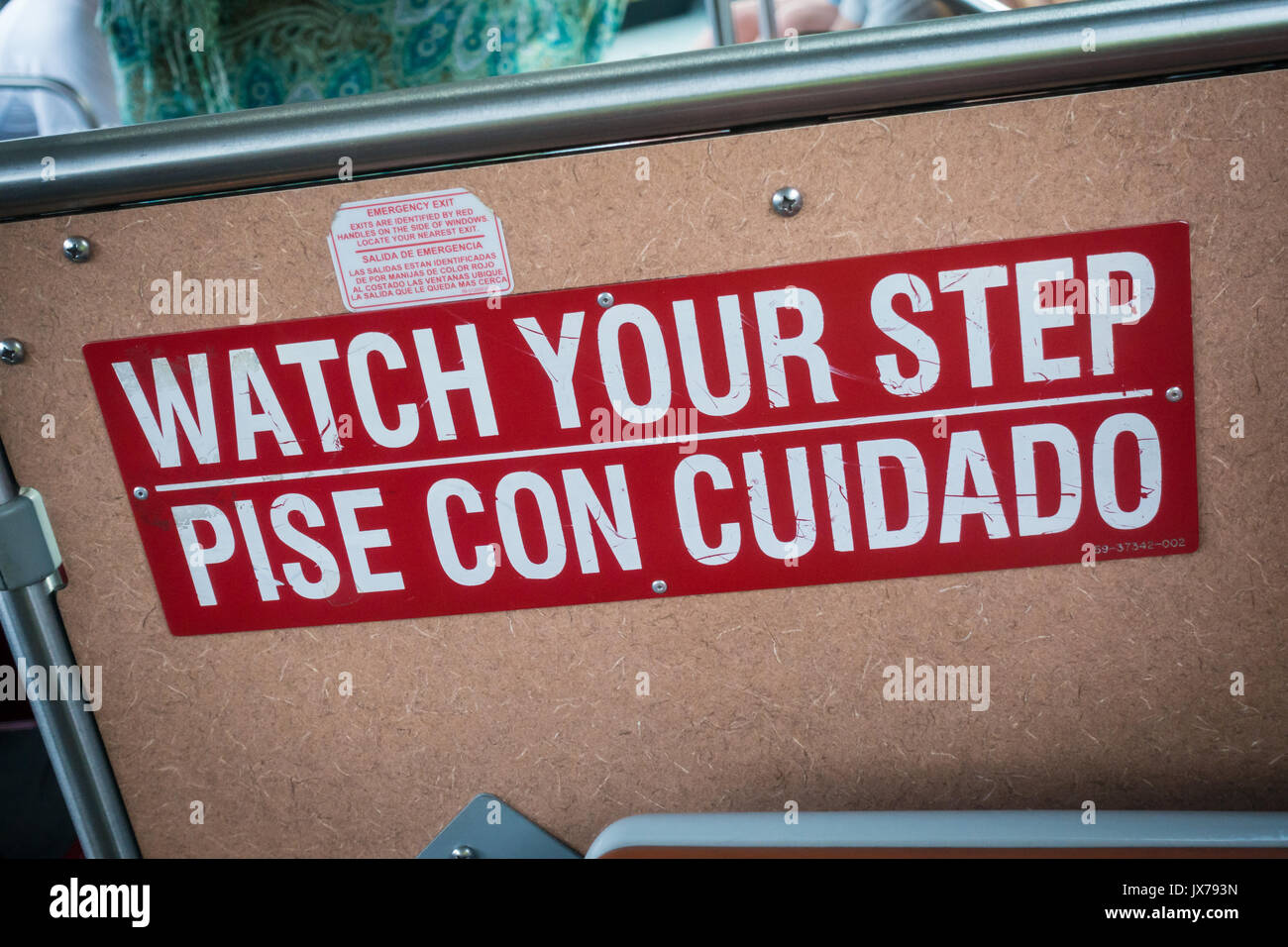 Watch Your Step Sign on a Disney World Transportation Bus Stock Photo