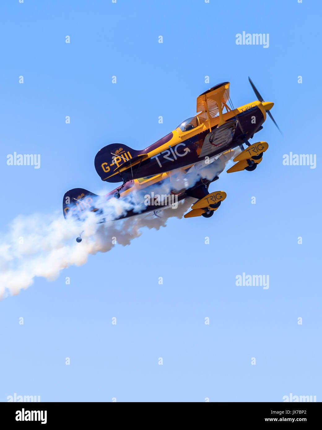 Trig Aerobatic Team performing close-formation aerobatic stunts in their Pitts Special S-1D biplanes Stock Photo