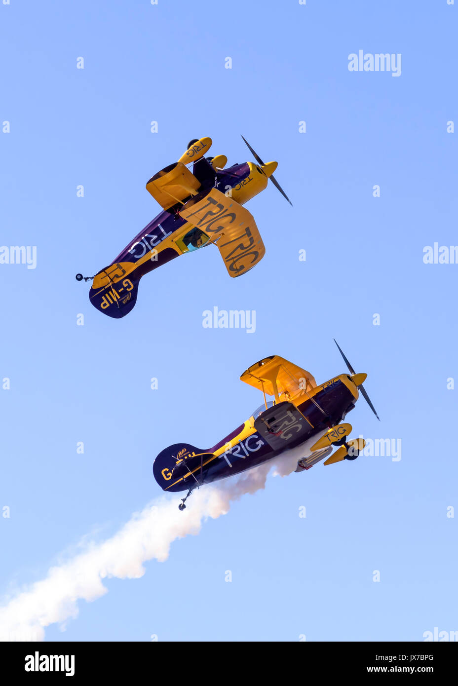 Trig Aerobatic Team performing close-formation aerobatic stunts in their Pitts Special S-1D biplanes Stock Photo