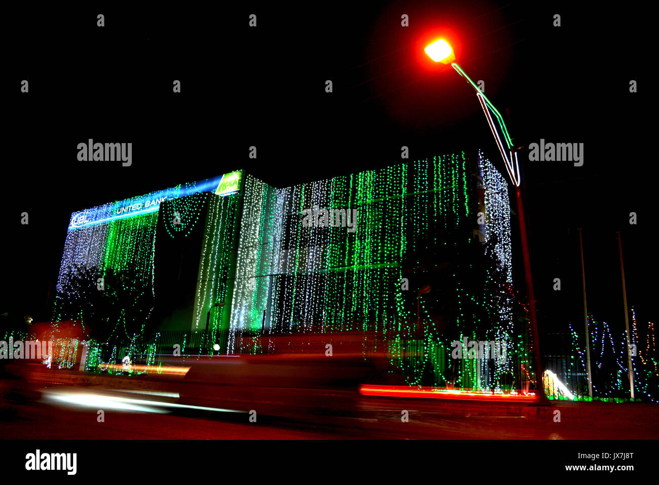 QUETTA, PAKISTAN, AUG 13: A beautiful illuminated view of United Bank pvt Limited Building on the occasion of the Pakistan Independence Day celebratio Stock Photo