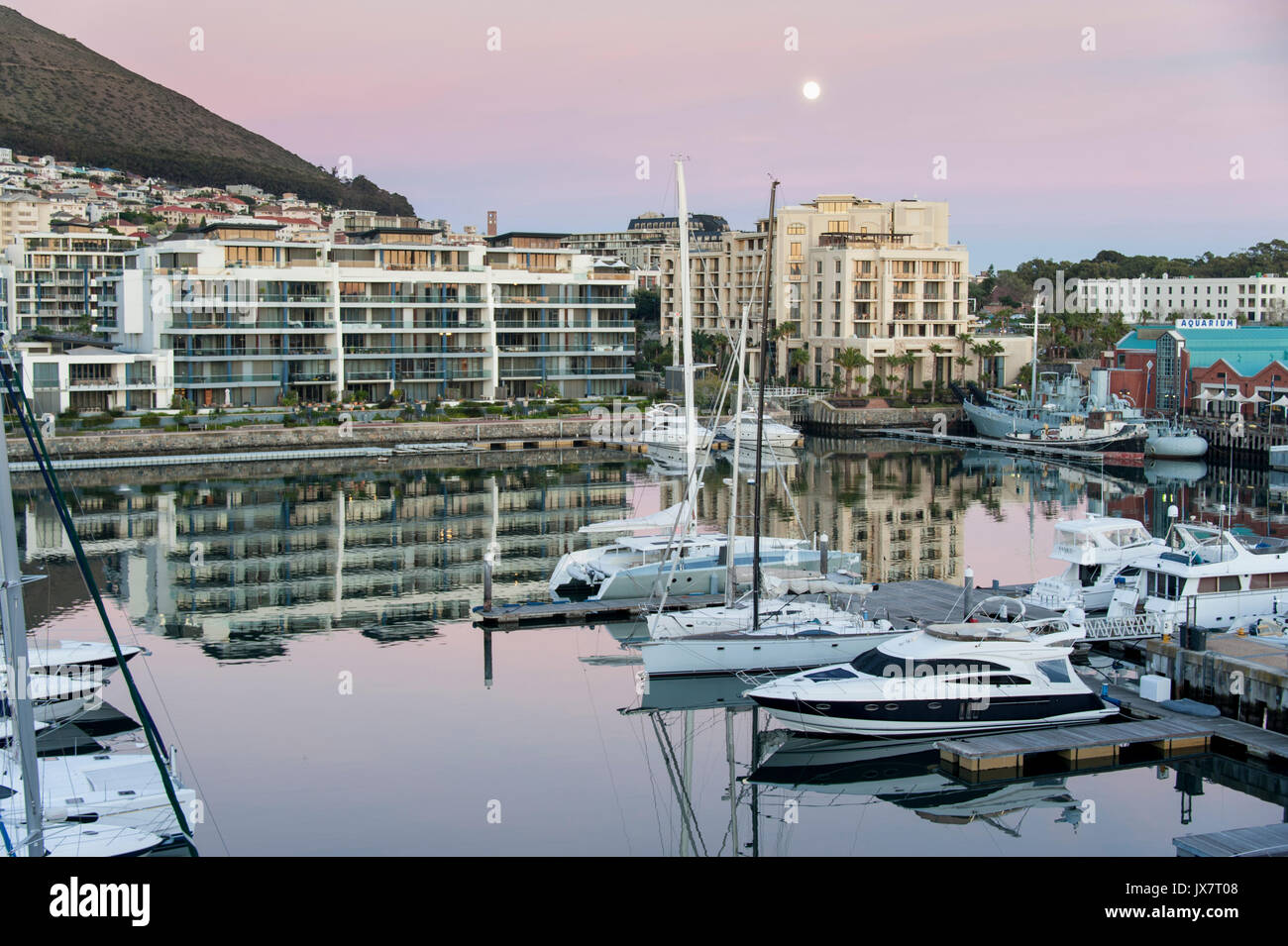 Reflections in harbor at sunrise at Capetown, South Africa. Stock Photo