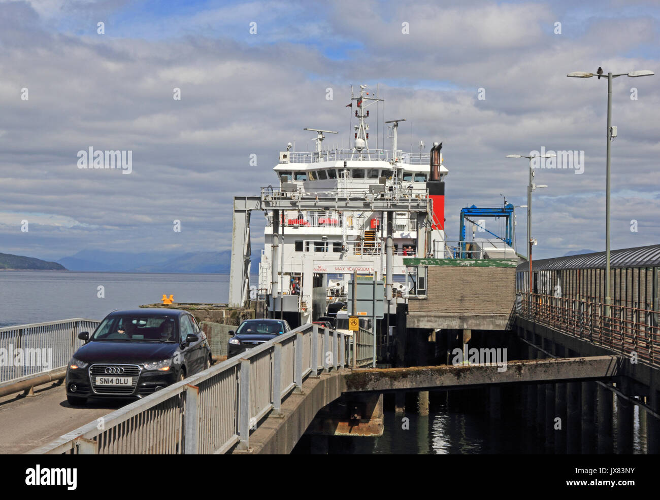 Passenger cars disembarking from ferry boat, Coruisk, Craignure, Isle of Mull, Scotland Stock Photo