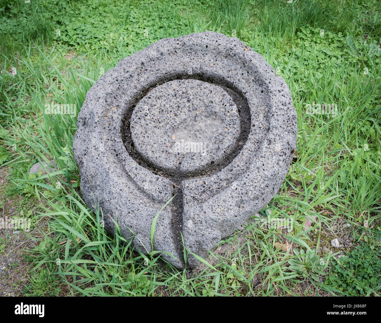 The ancient stone hand mill oil Stock Photo - Alamy