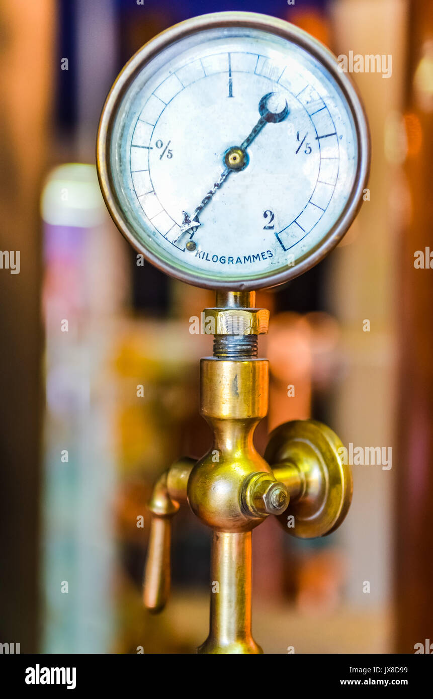 Detail of vintage measurement device and valve with nice bokeh background Stock Photo