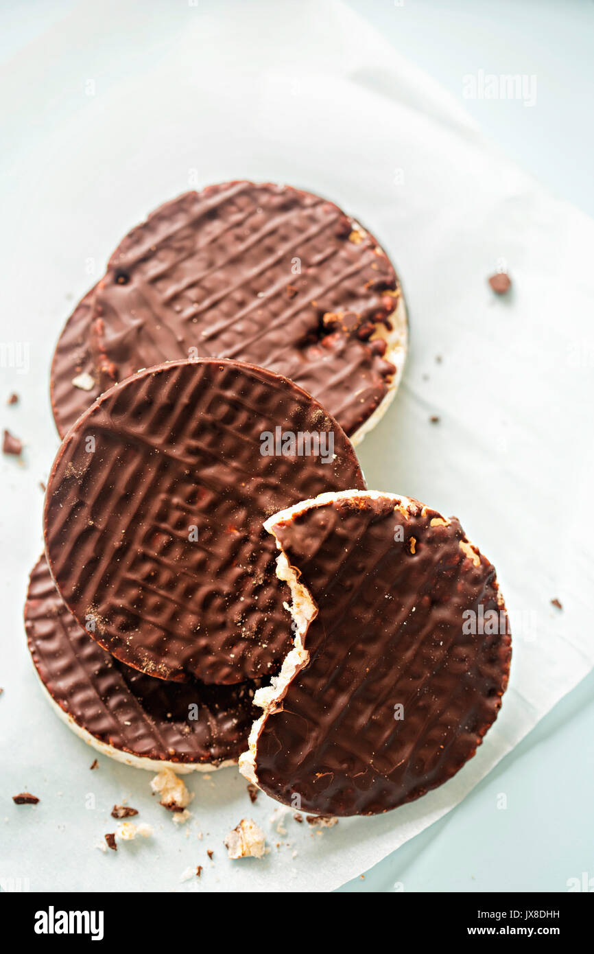 Dark chocolate coated rice cakes Stock Photo Alamy