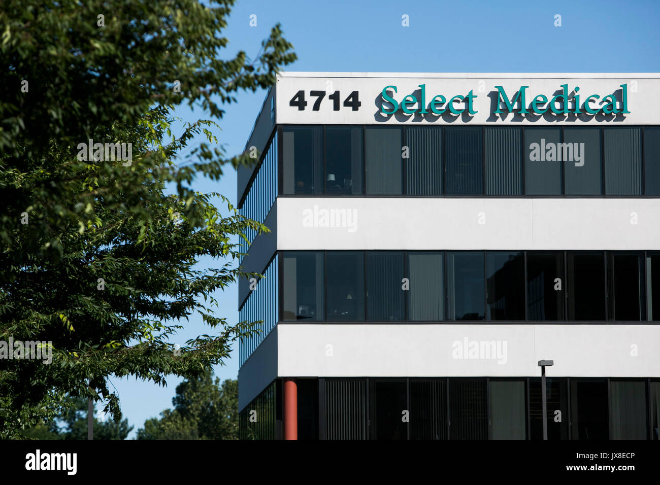 A logo sign outside of the headquarters of Select Medical in Mechanicsburg, Pennsylvania on July