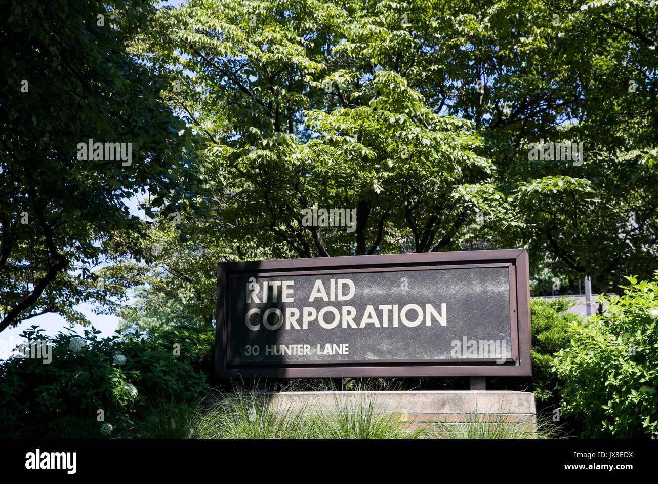 A logo sign outside of the headquarters of the Rite Aid Corporation in