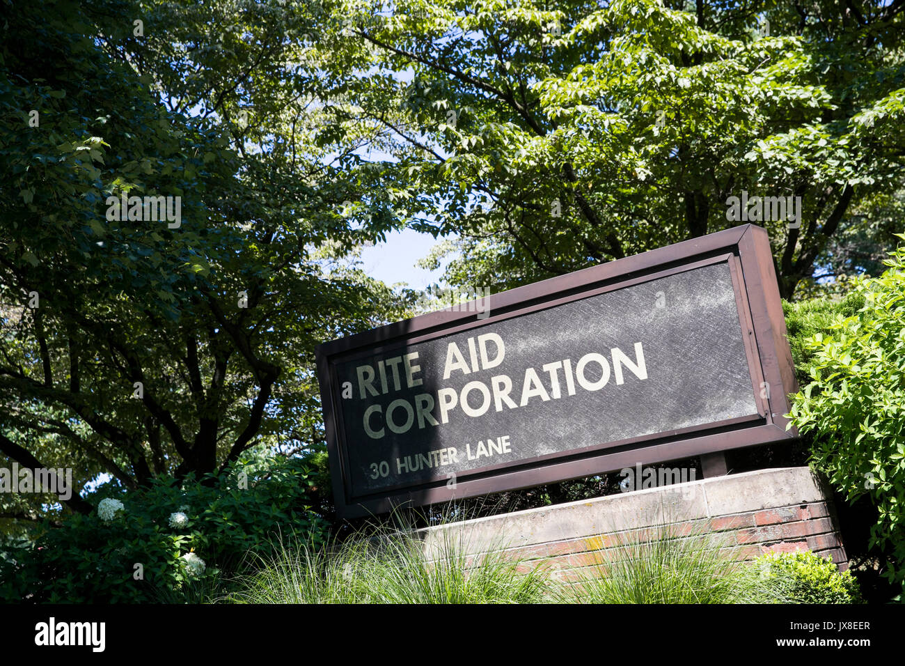 A logo sign outside of the headquarters of the Rite Aid Corporation in