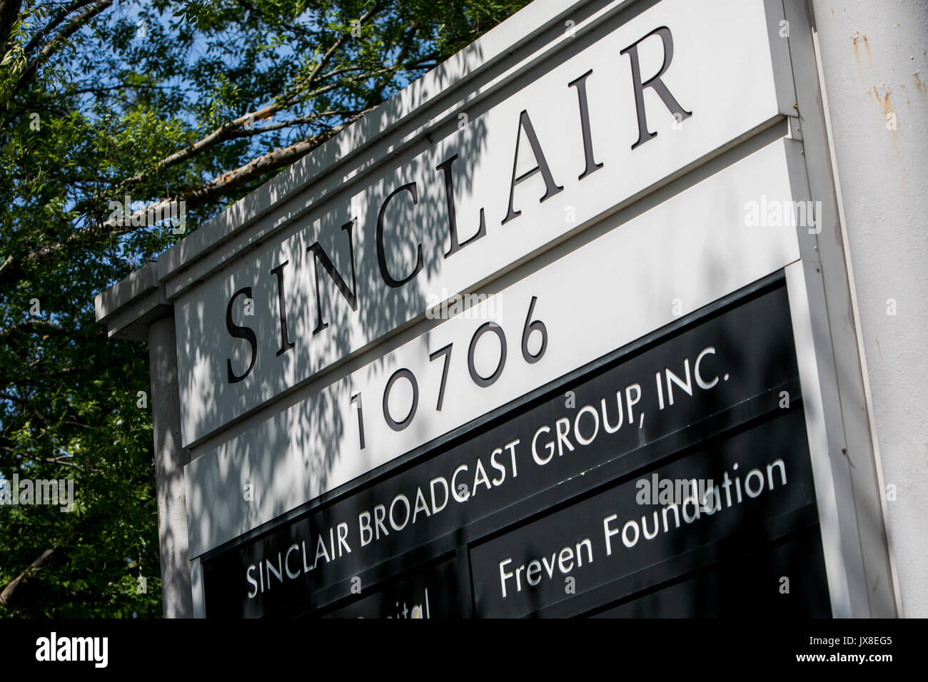 A logo sign outside of the headquarters of the Sinclair Broadcast Group in Cockeysville, Maryland, on August 13, 2017. Stock Photo