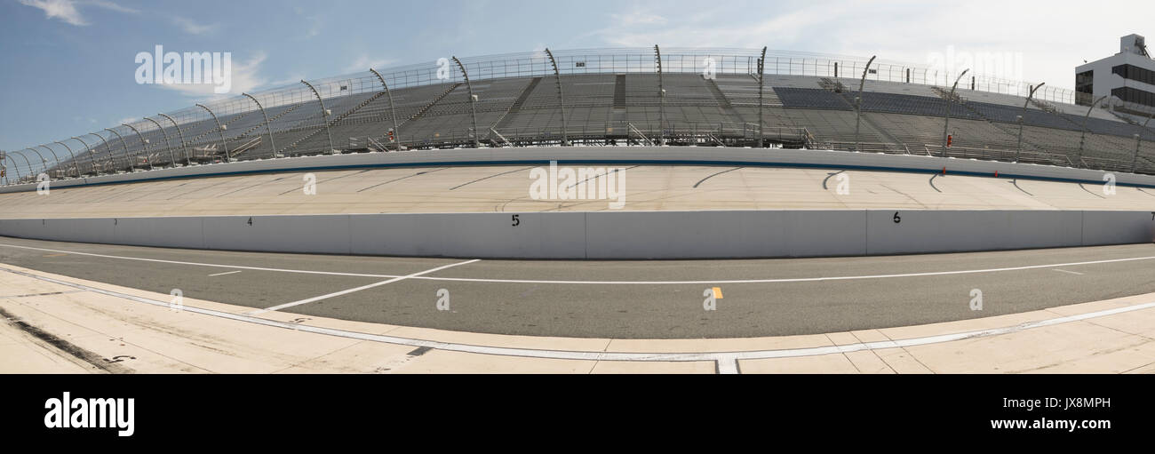 Pit row and backstretch  at Motor Speedway with empty stands. Stock Photo