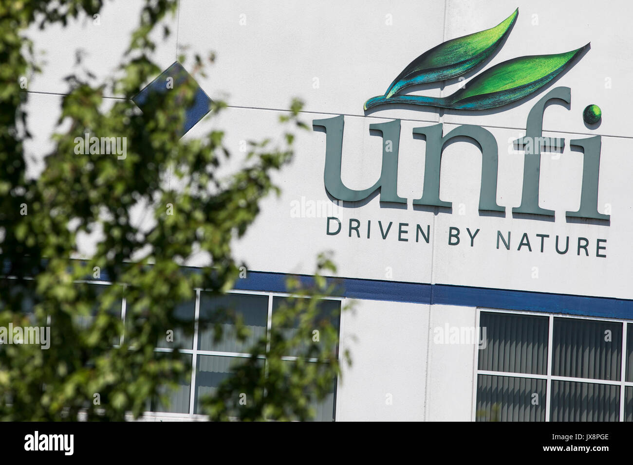A logo sign outside of a facility occupied by United Natural Foods (UNFI) in York, Pennsylvania on July 30, 2017. Stock Photo