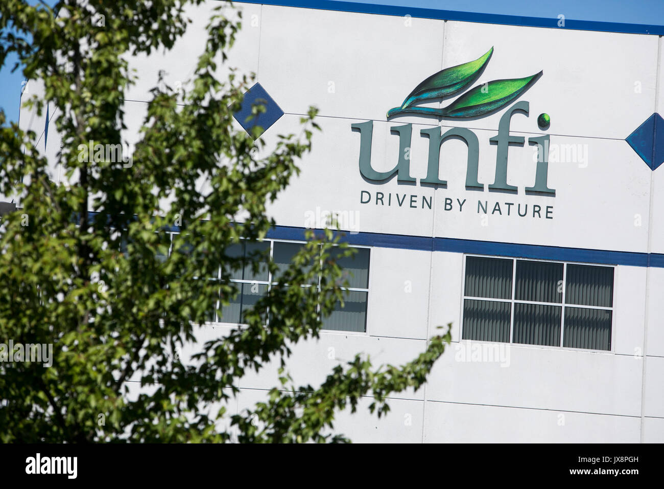 A logo sign outside of a facility occupied by United Natural Foods (UNFI) in York, Pennsylvania on July 30, 2017. Stock Photo