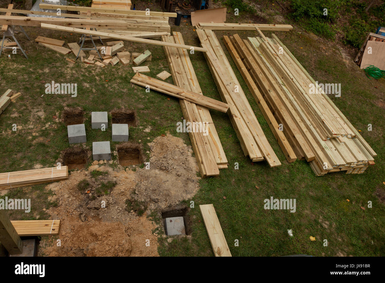lumber being used in construction of a deck Stock Photo Alamy