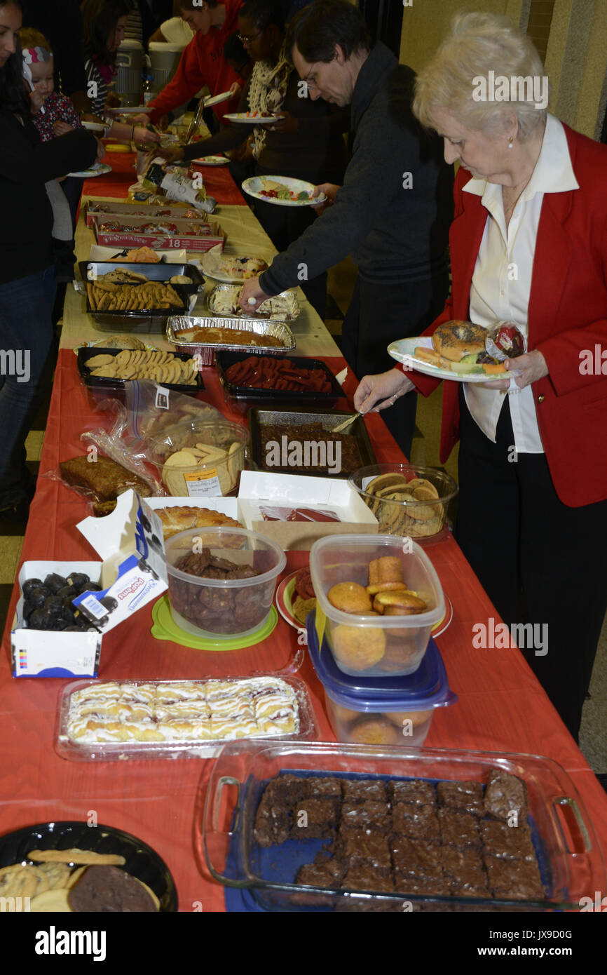 Several people eating at a buffet dinner Stock Photo - Alamy