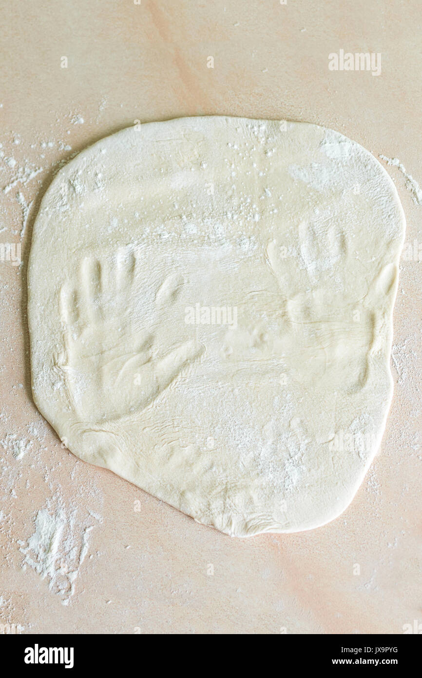 Dough with handprints Stock Photo Alamy