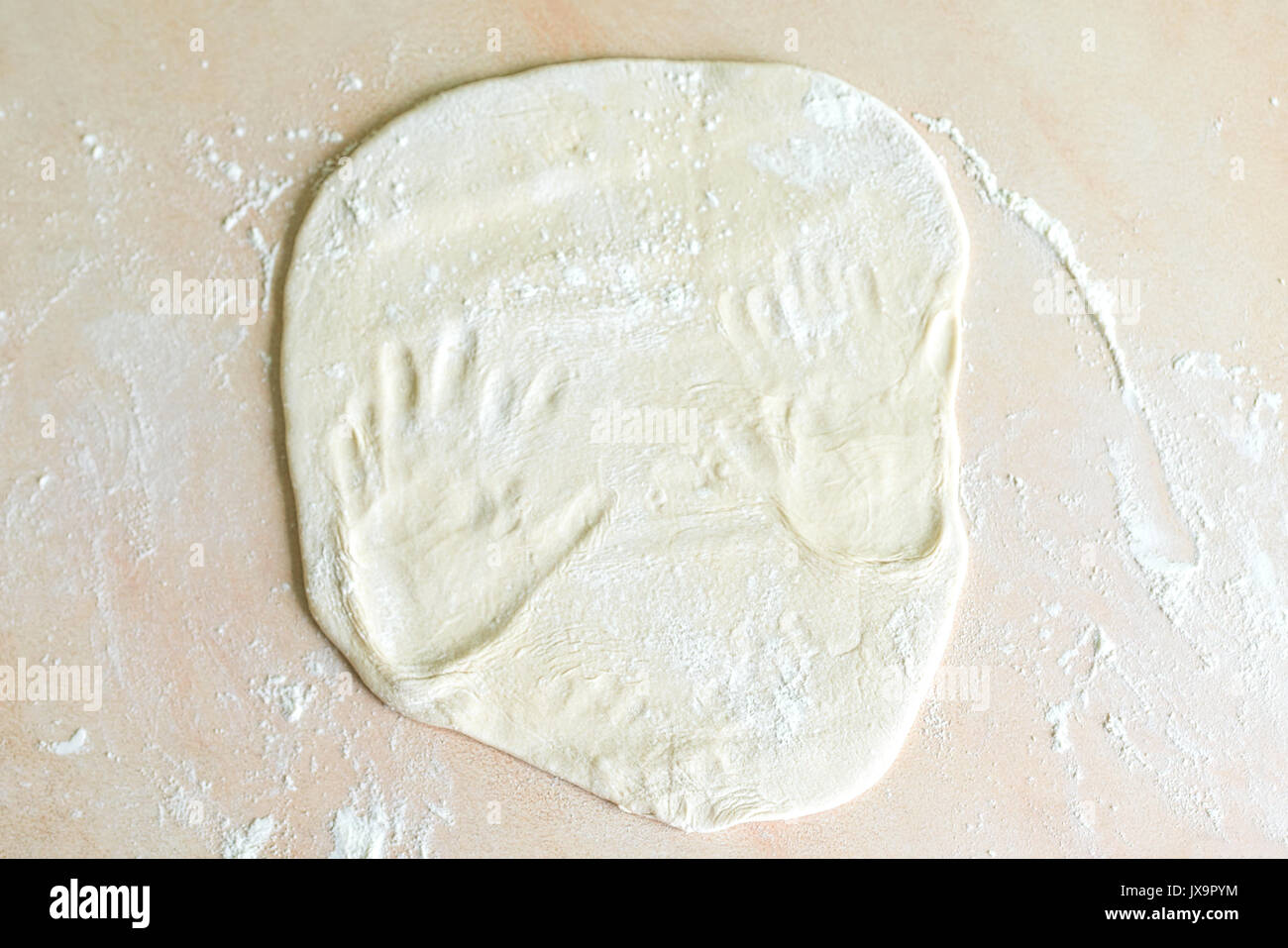 Dough with handprints Stock Photo Alamy