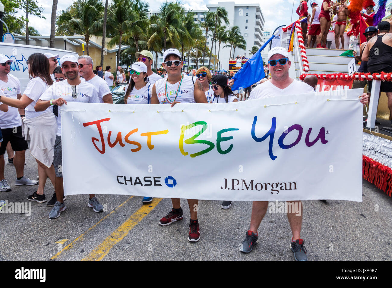Miami Beach Florida,Lummus Park,Gay Pride Week,LGBTQ,LGBT,Pride Parade,participants,staging area,Chase JP Morgan corporate sponsors,banner,FL170430045 Stock Photo