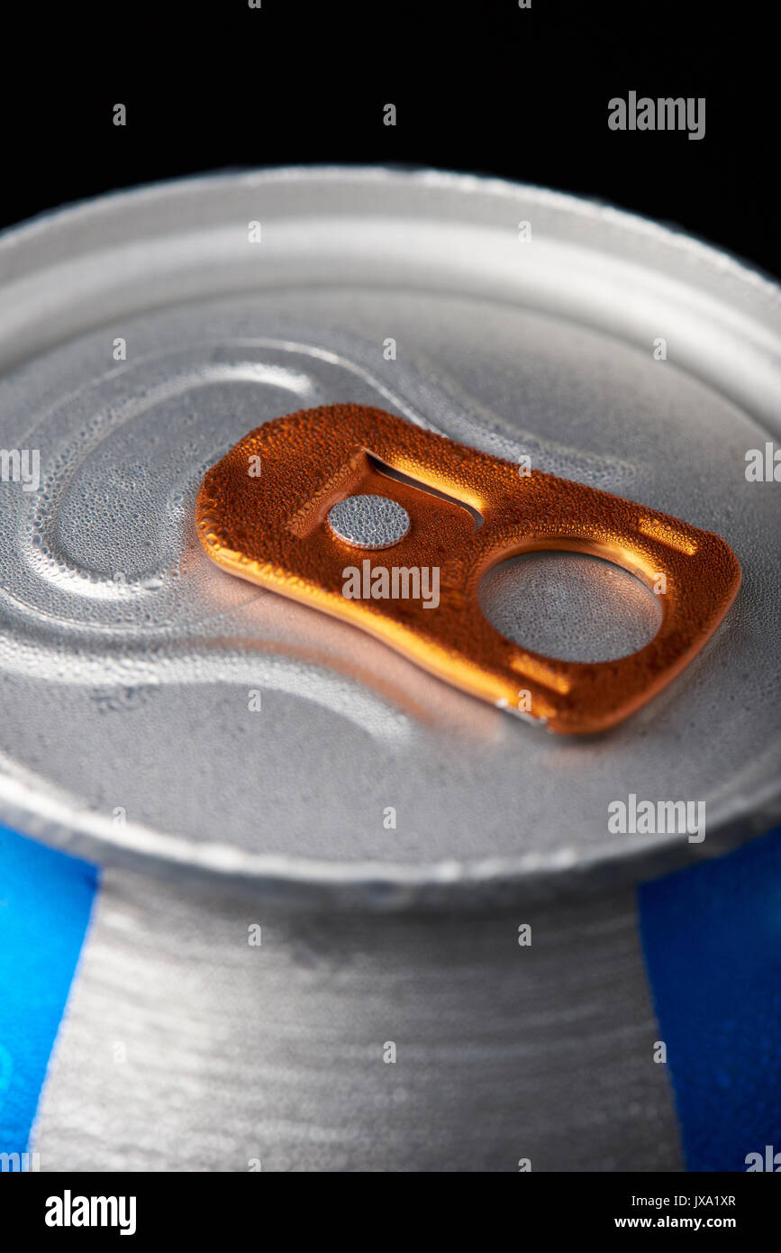 Macro of metal can with cold water isolated on black background Stock Photo