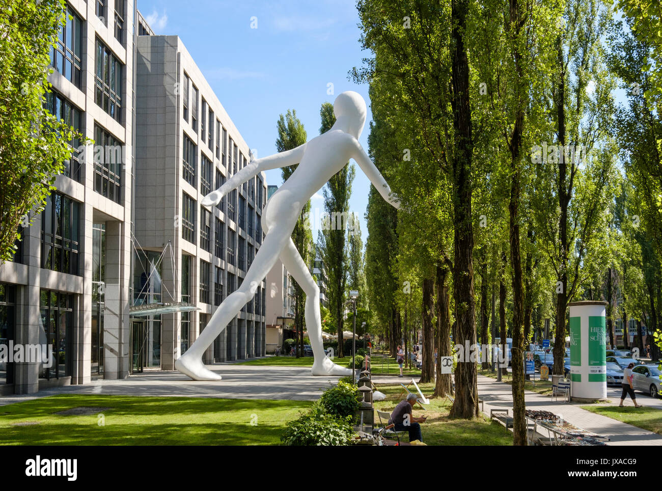 Walking Man sculpture by Jonathan Borofsky in front of insurance company  Munich Re, Leopoldstrasse, Schwabing, Munich Stock Photo - Alamy