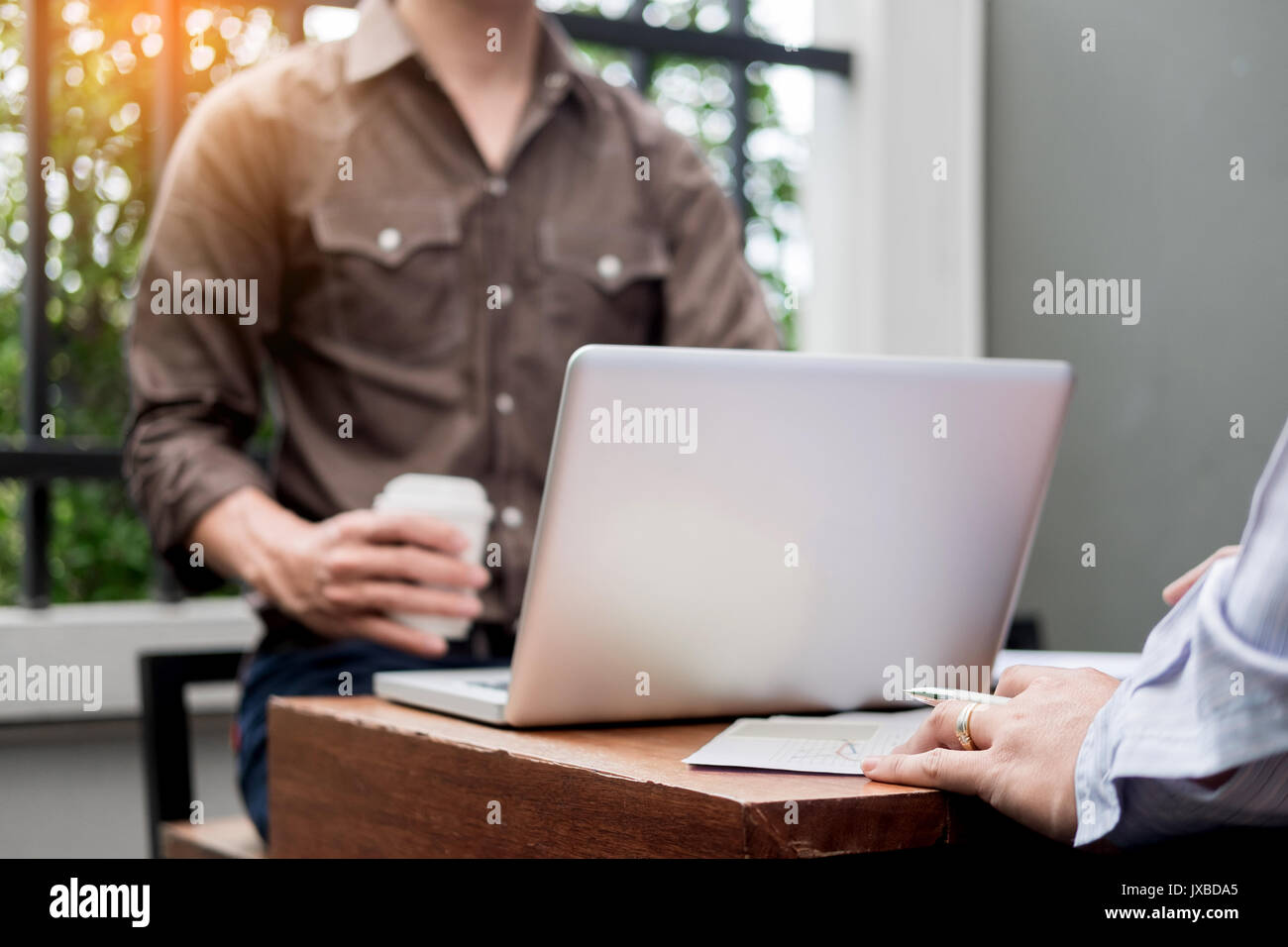 Business meeting  in outdoor. documents account managers crew working with new startup project Idea presentation, analyse marketing plans. Stock Photo