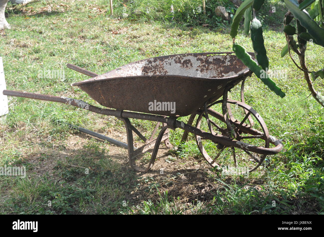 Rusty wheelbarrow hires stock photography and images Alamy