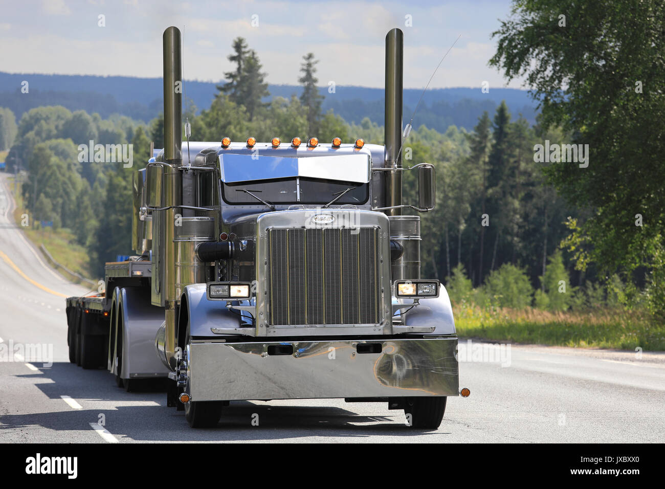 IKAALINEN, FINLAND - AUGUST 10, 2017: Beautiful silver Peterbilt 359 S year 1973 semi trailer of Fredrik Biehl takes part in the ca. 420 km long truck Stock Photo