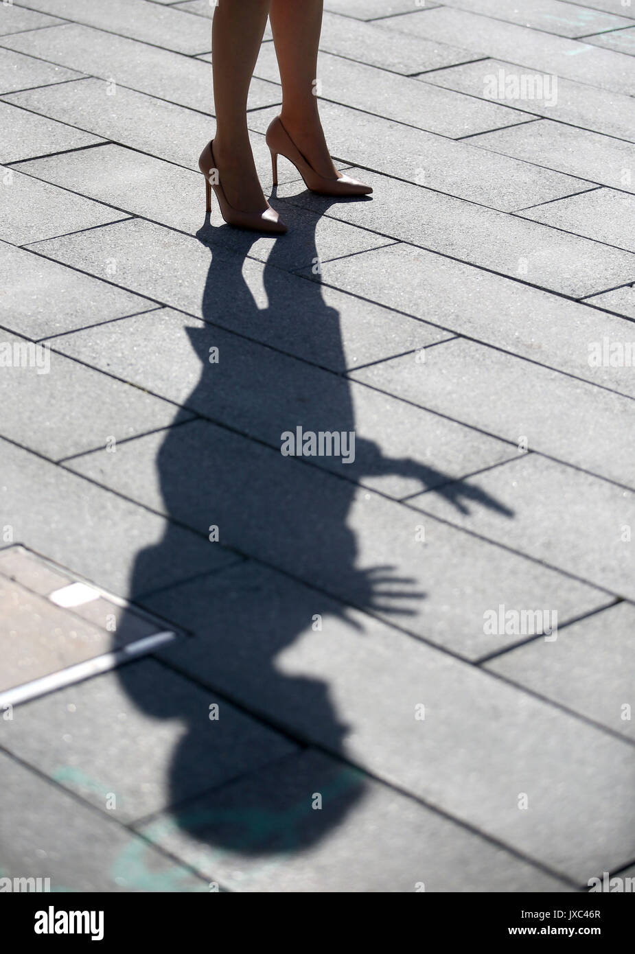 Detail of First Minister Nicola Sturgeon's shadow during a visit to GSK (GlaxoSmithKline) in Montrose, where she opened their new £44 million aluminium salts facility. Stock Photo