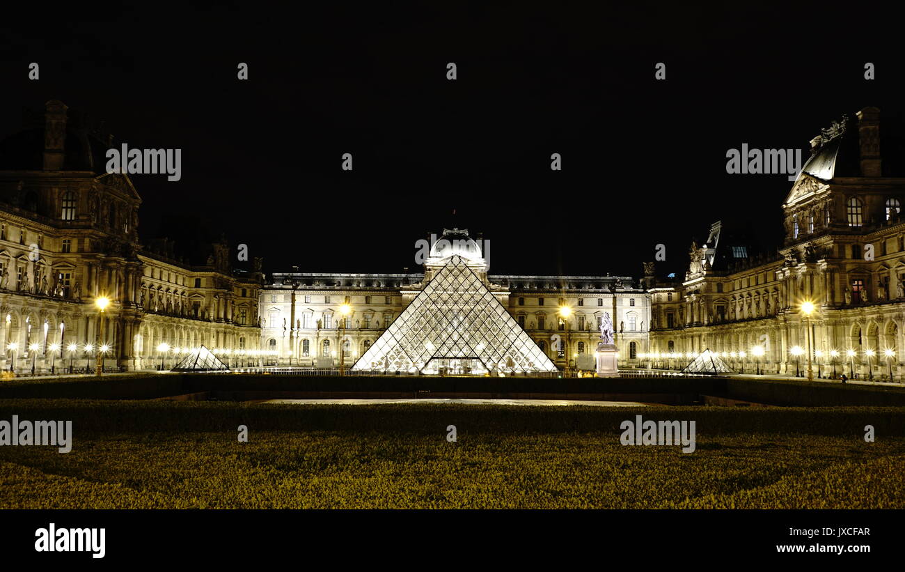 Louvre Museum at night, Paris Stock Photo