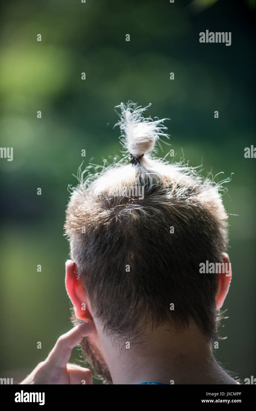 Hair style tied hires stock photography and images Alamy
