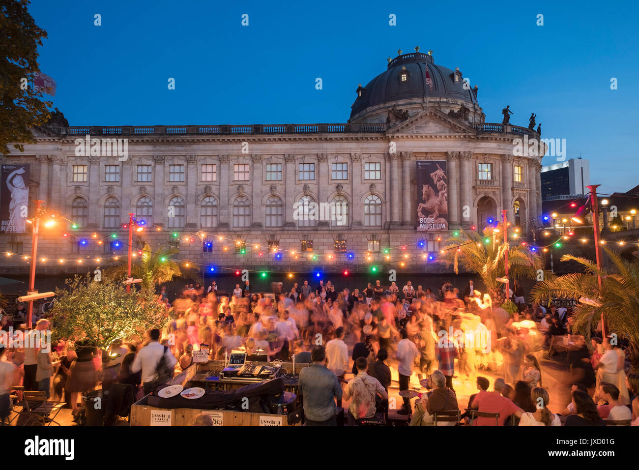 Outdoor dancing on summer evenings riverside bar at Strandbar Mitte in Monbijou Park in Berlin Germany Stock Photo