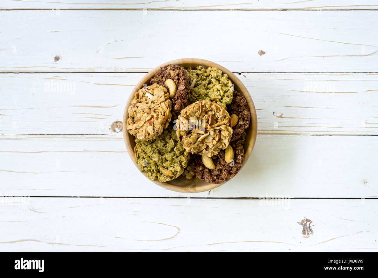 top view granola bar in bowl on wood table background. Stock Photo