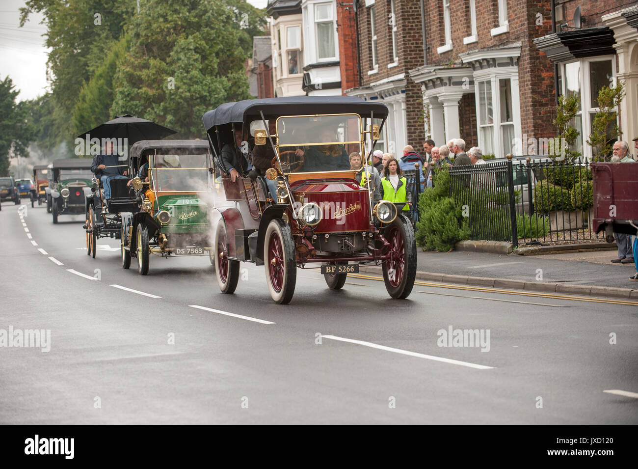 Stanley steam cars driving through Driffield at the steam and vintage rally Stock Photo