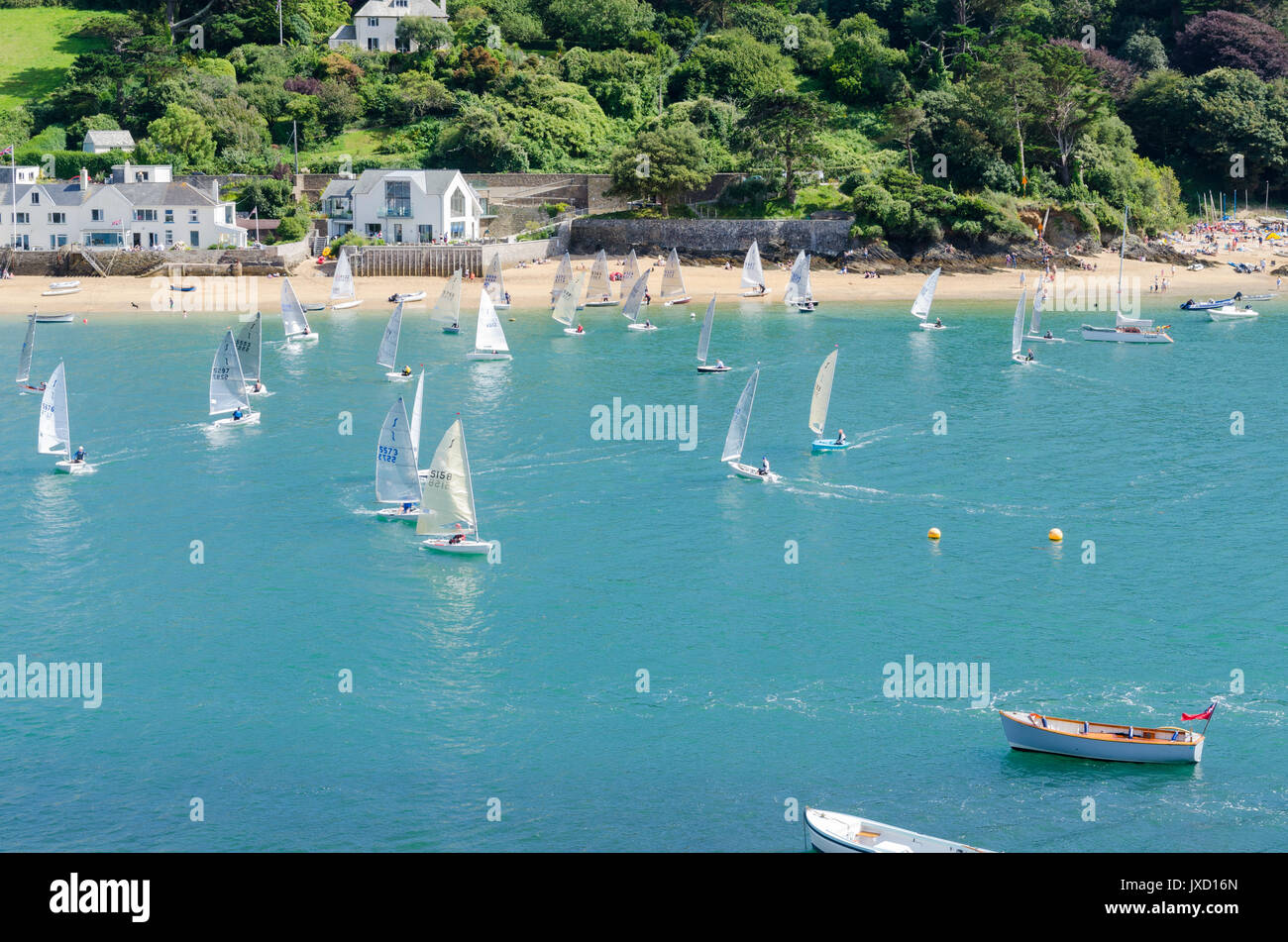 Solos boats racing in the Salcombe estuary during Salcombe Yacht Club Regatta Week Stock Photo