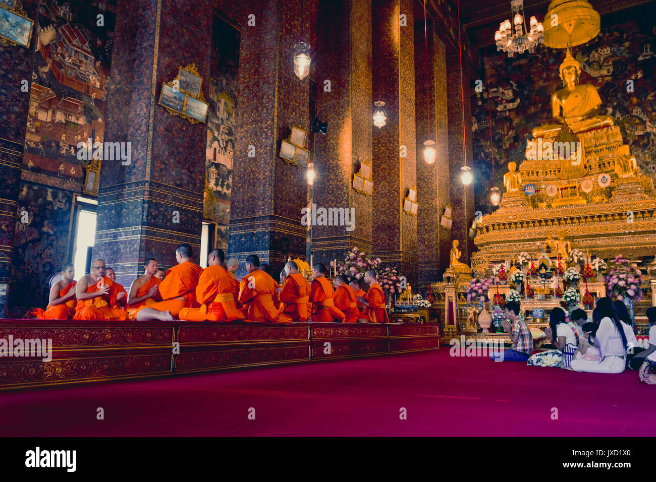 BANGKOK, THAILAND DECEMBER 26, 2016 Buddhist monks pray at Wat Pho