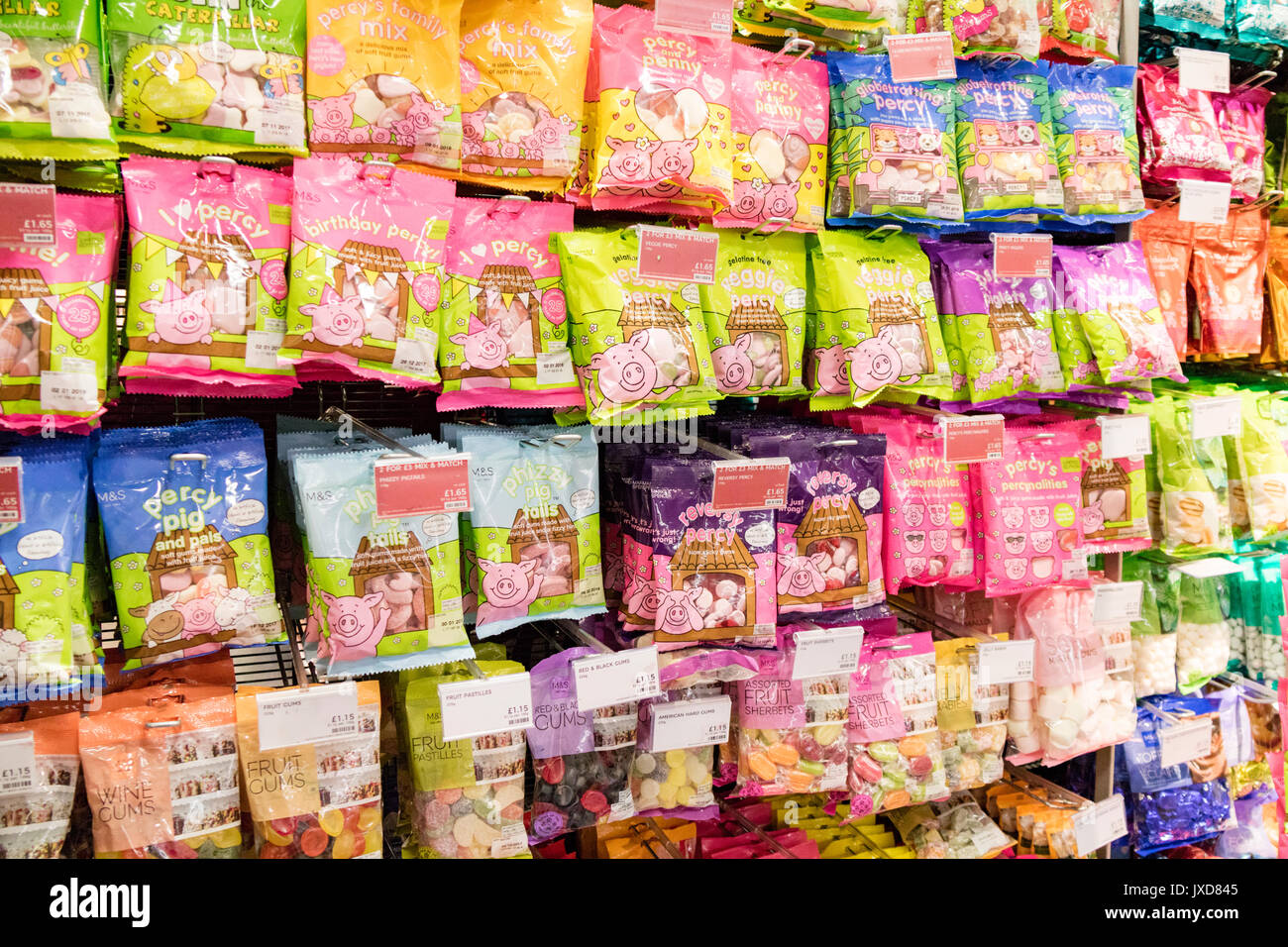 Children's sweets on display in a M&S store. England, UK Stock Photo