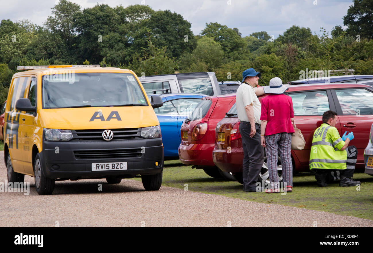Elderly couple locked out of their car with the AA patrol staff, England, UK Stock Photo