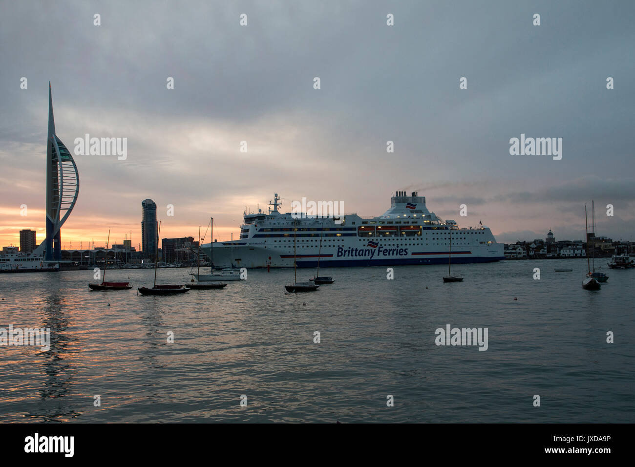 Brittany Ferries Passenger ferry MV Normandie arriving at Portsmouth from Caen on 16 August 2017. The Spinnaker Tower is to the left of the image Stock Photo