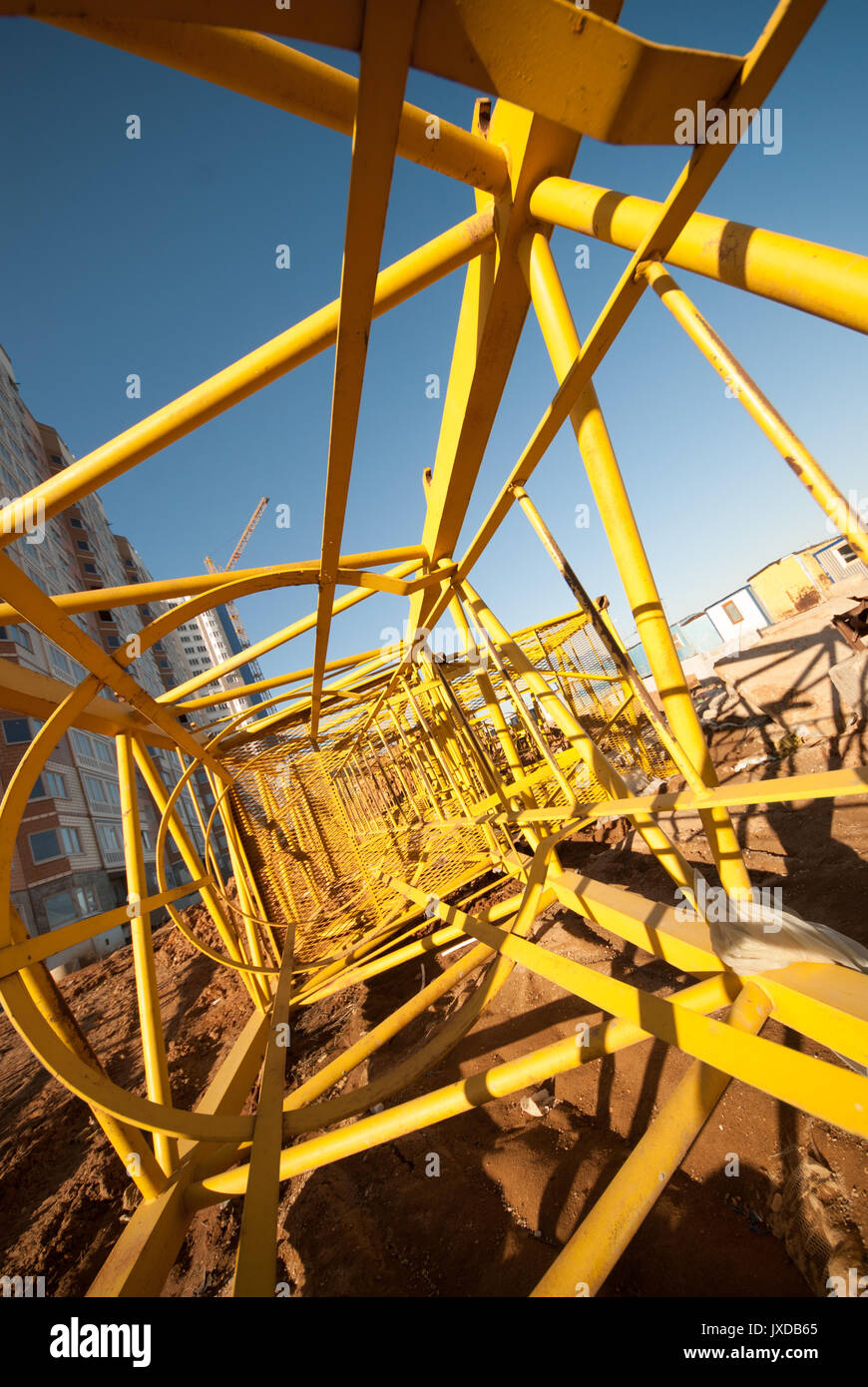 Steel structure of disassembled building tower cranes at construction site Stock Photo Alamy