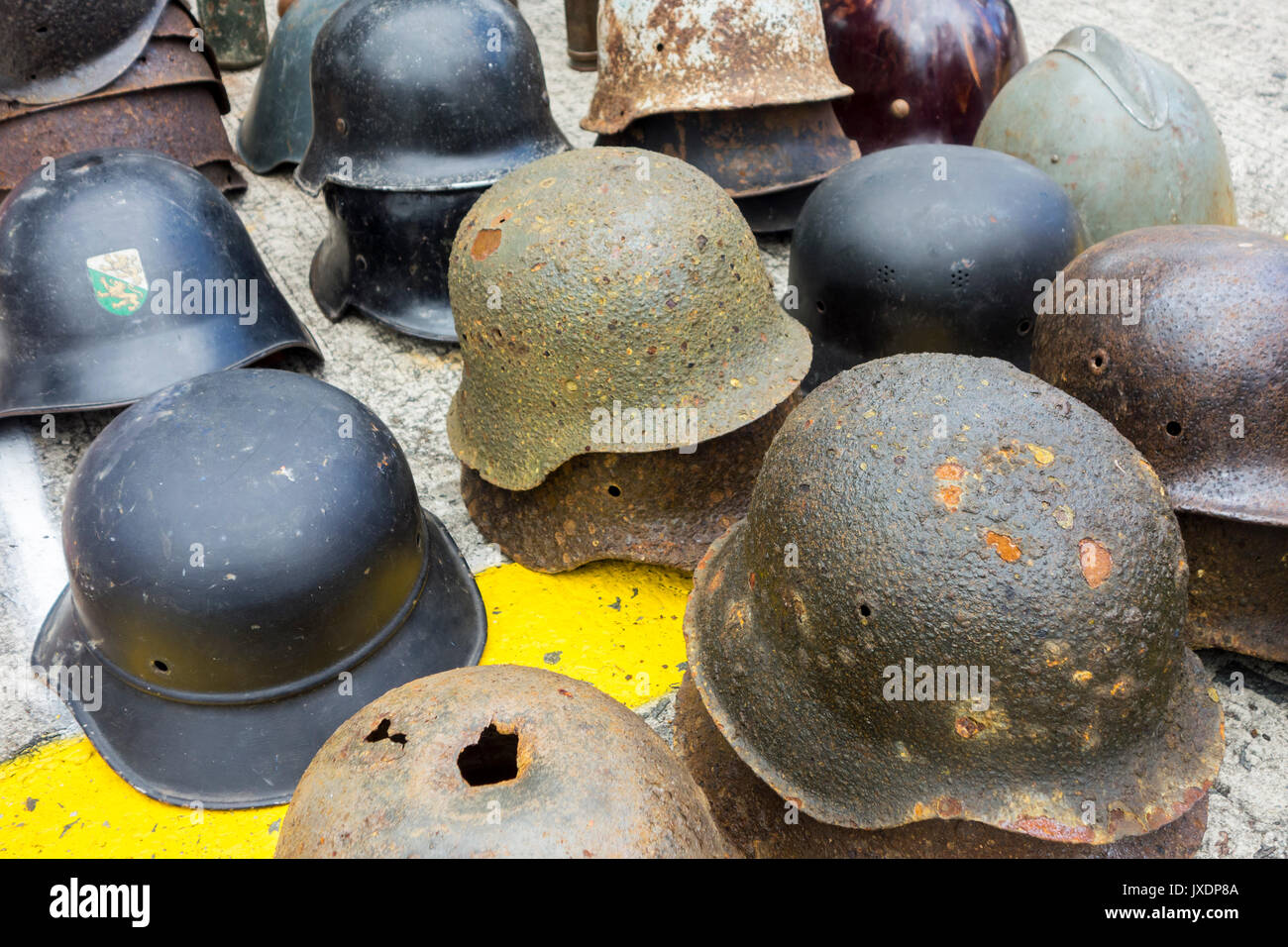 German World War Two helmets for sale at stand of WW2 militaria fair Stock Photo