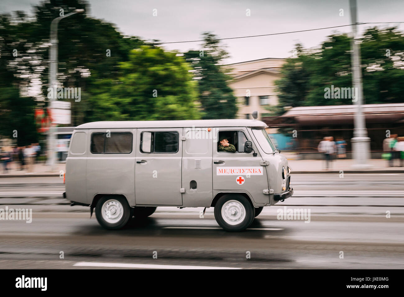 Minsk, Belarus - June 28, 2017: Soviet Emergency Ambulance Van UAZ Car Moving On Street In A Summer Day Stock Photo