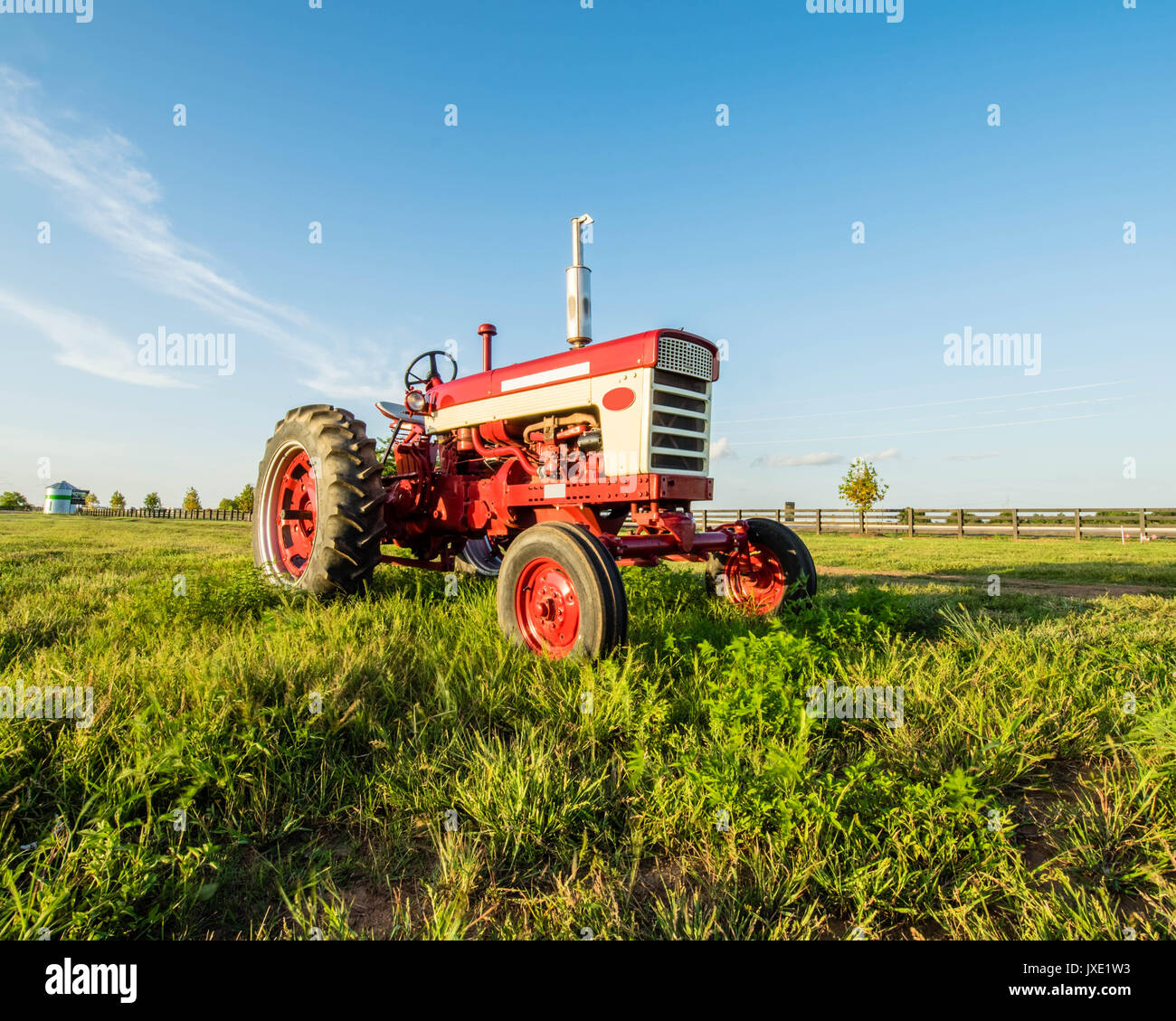 The family tractor is allowed to rest. Stock Photo