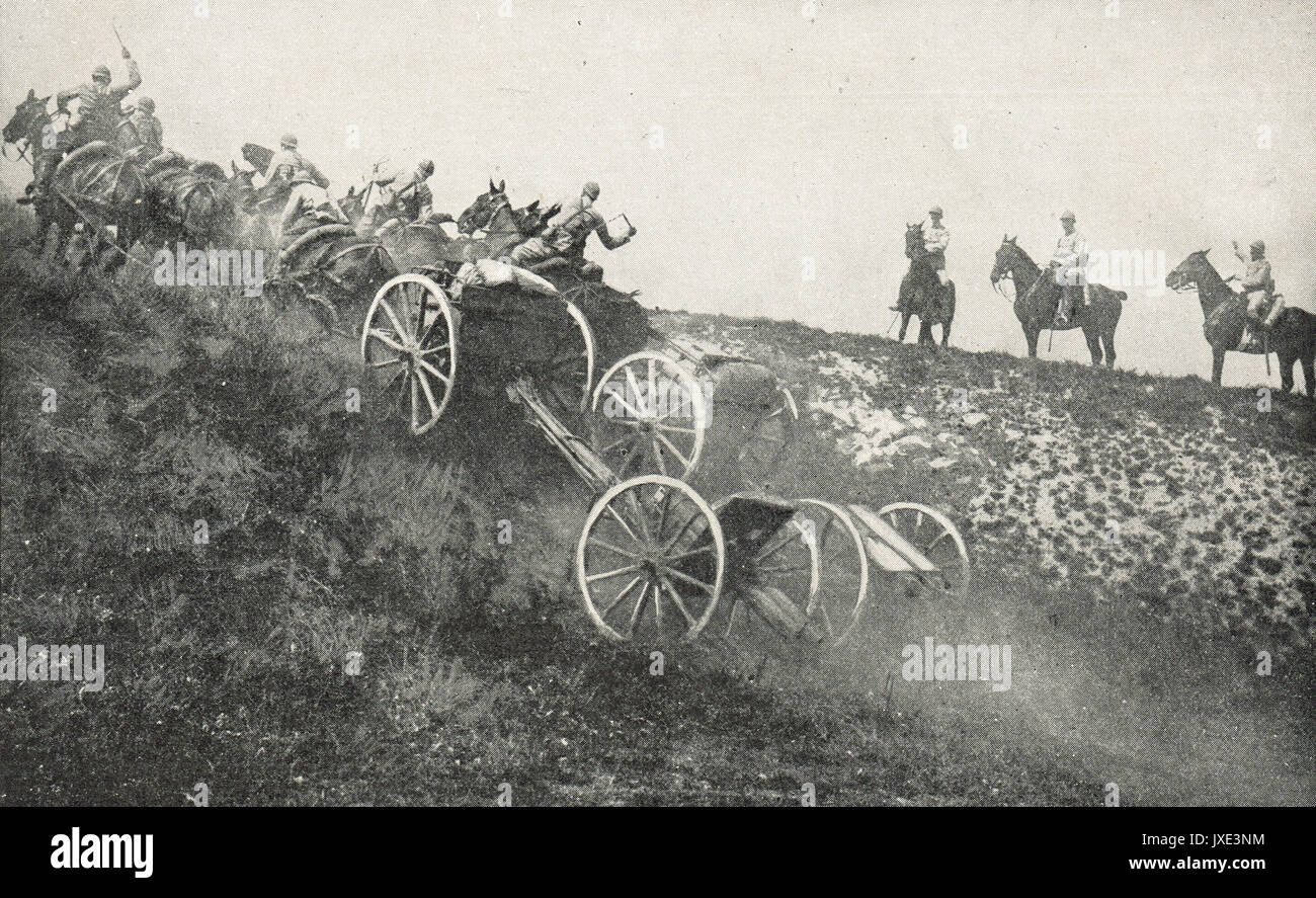 French galloping a field gun uphill, WW1 Stock Photo