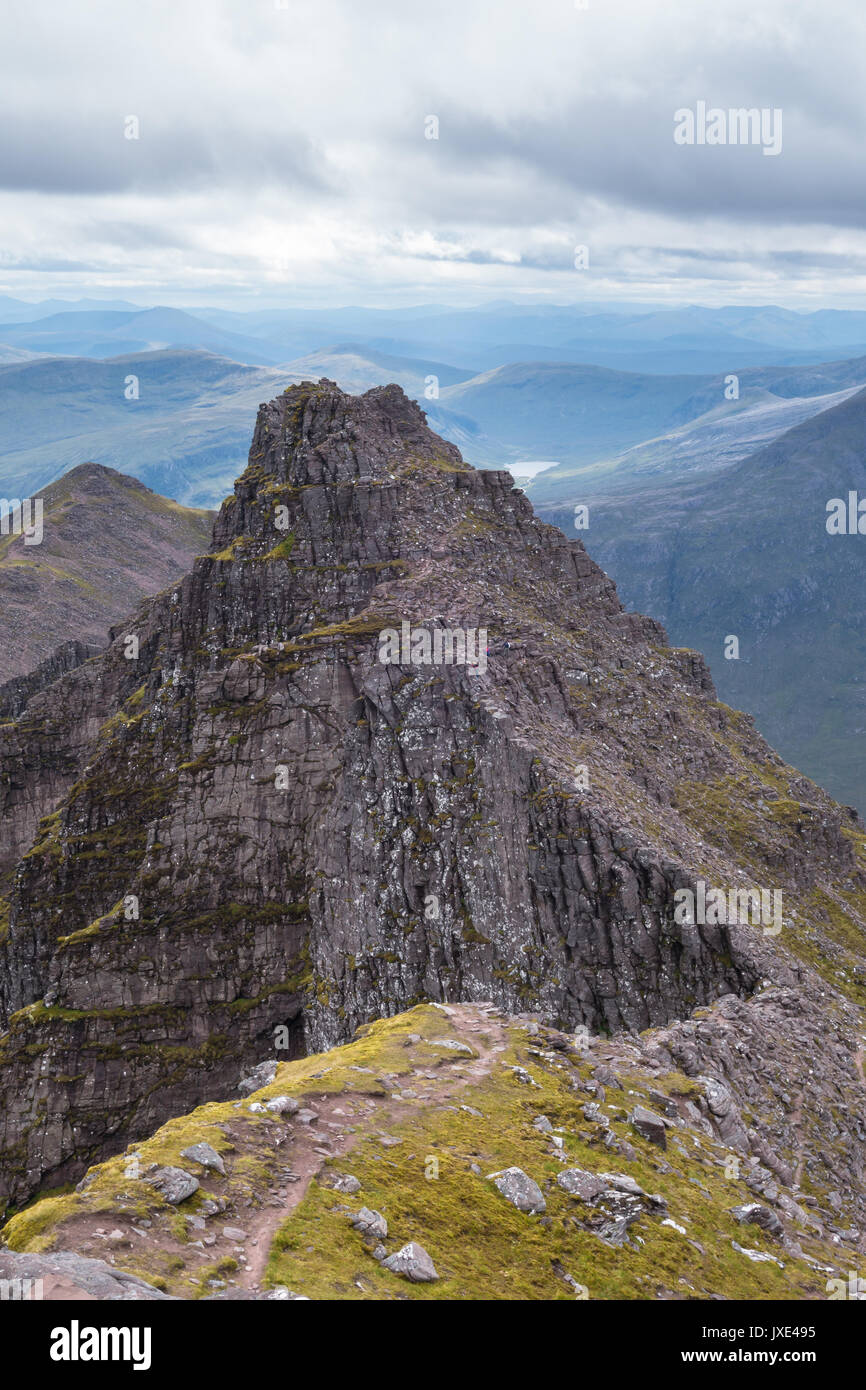 The rock ridge leading to t An Teallach Munro peak Sgurr Fiona on a ...